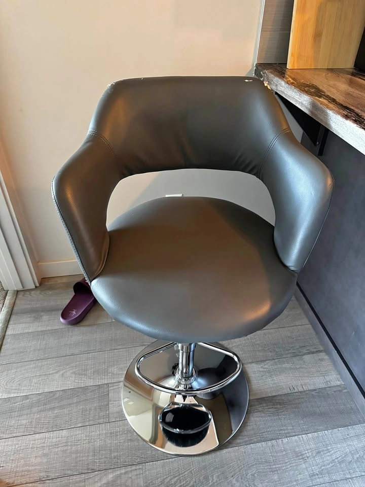 Grey swivel bar stool