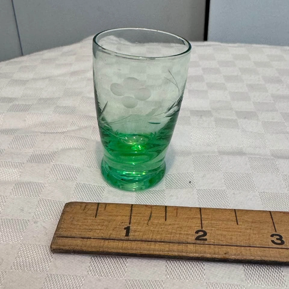 Vintage, tiny antique shot glass in green etched glass.