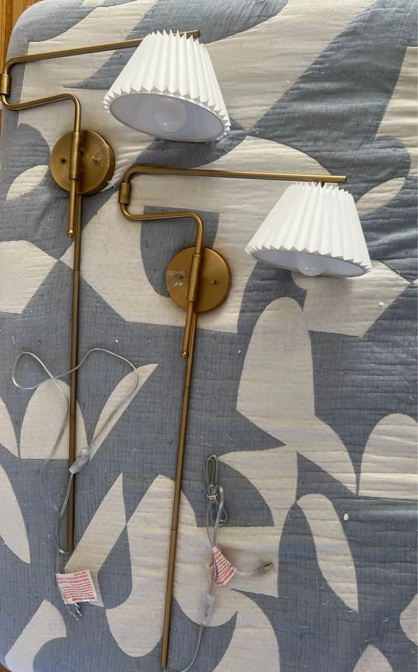 Pair of brass swing arm wall sconces with pleated white shades - photo 2