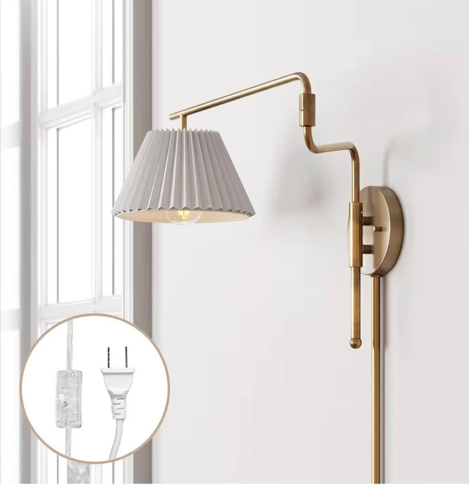 Pair of brass swing arm wall sconces with pleated white shades - photo 3