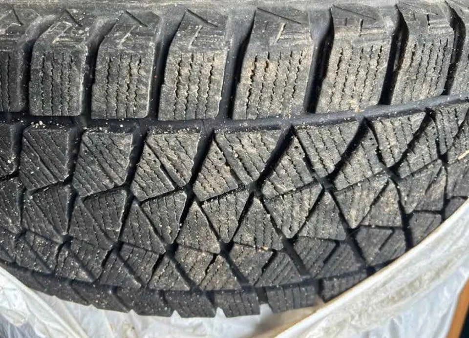 Subaru rims on Bridgestone blizzaks winter tires 225 50 17 - photo 3