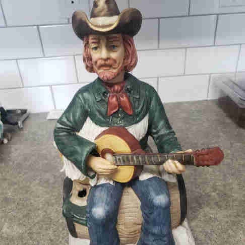 Melody in Motion - Guitarist on Barrel Musical Figurine