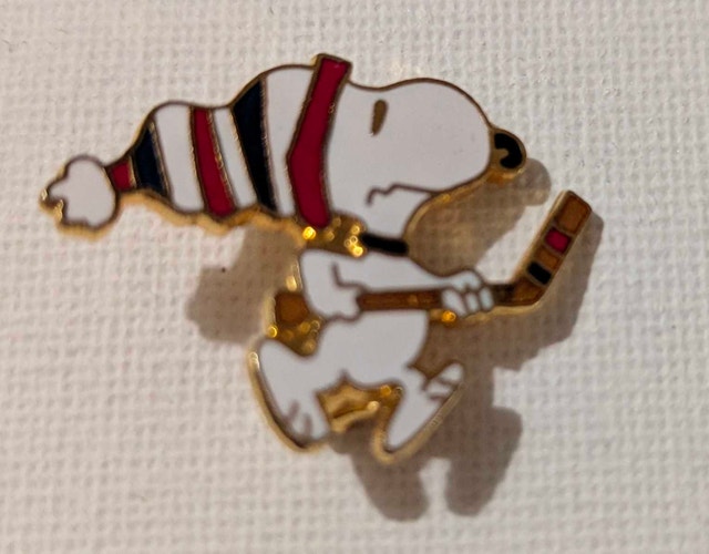 Vintage Aviva Snoopy Playing Hockey Lapel Pin