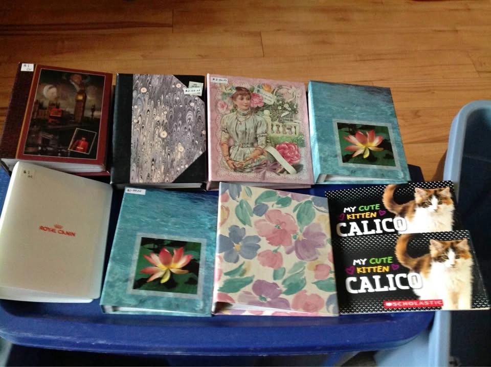 4x6 photo albums and 2 cat books