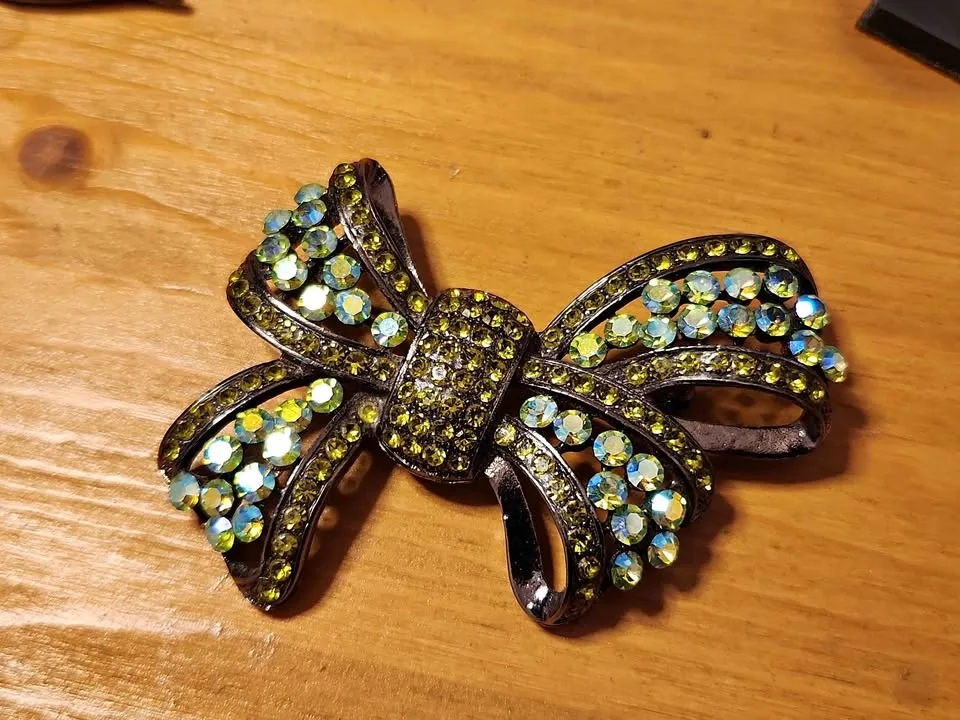 Vintage Signed ROM Bow Brooch