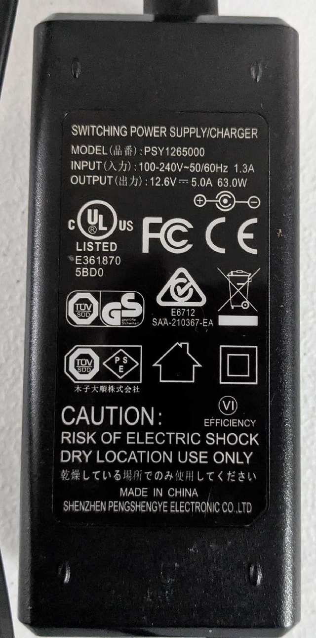 Power adapter - 12.6v / 5.0A / 63 W (New) - photo 4