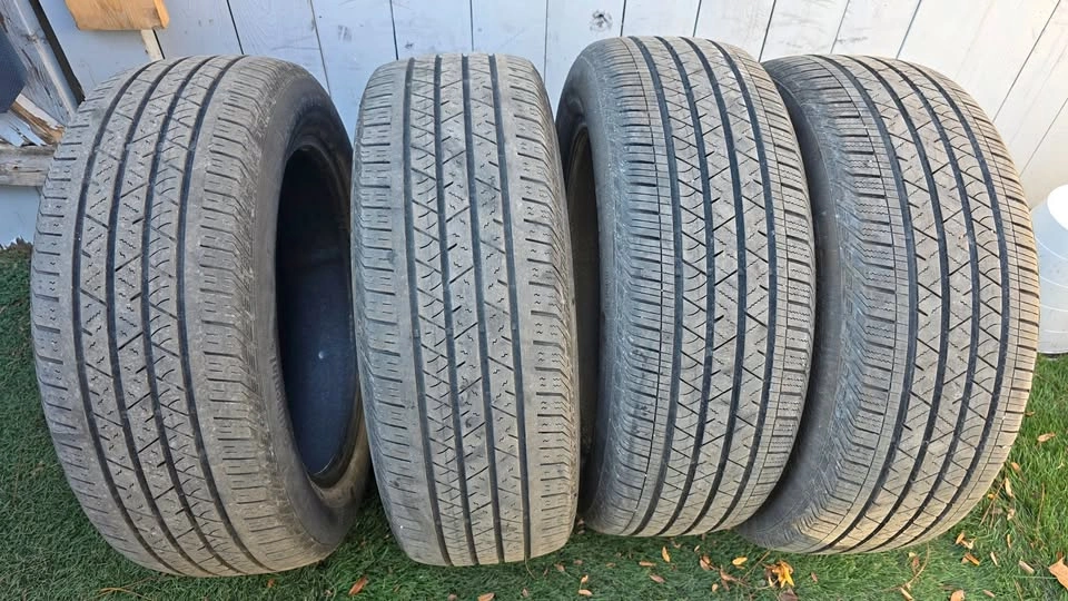 235/55/19 continental all season tires 90% tread