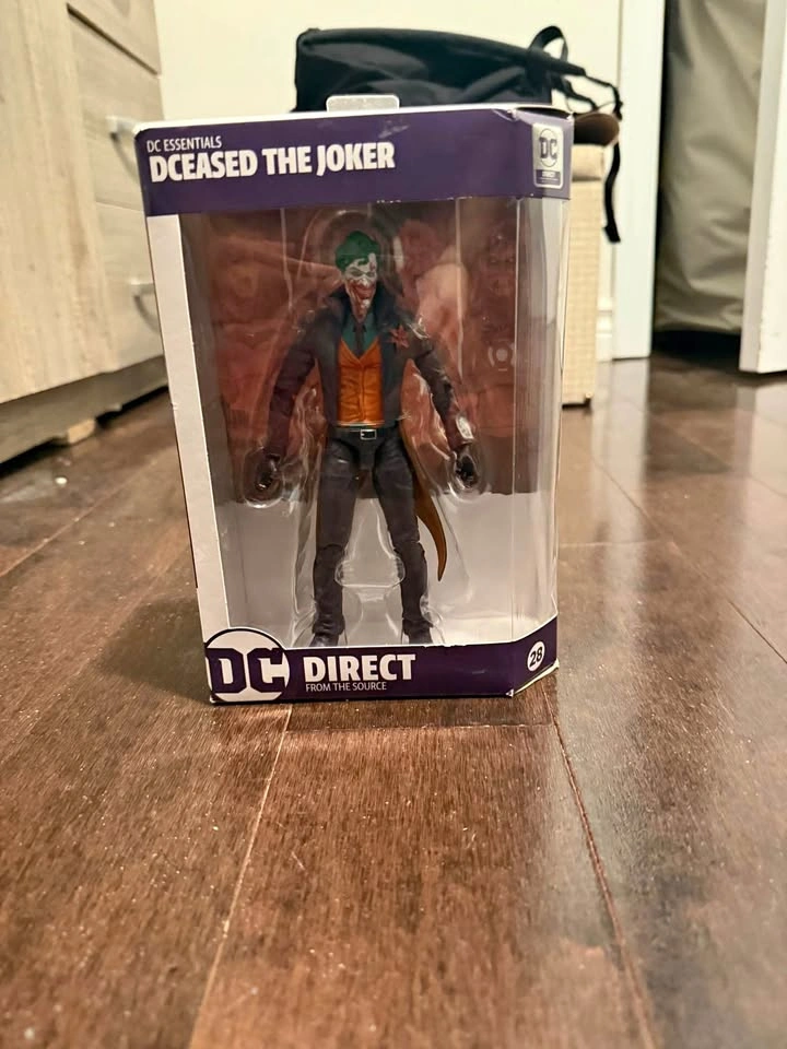 DC Essentials DCEASED The Joker action figure