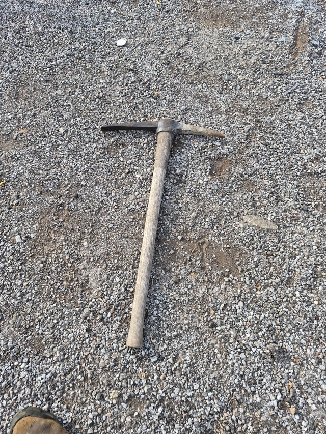 Pickaxe tool with wooden handle