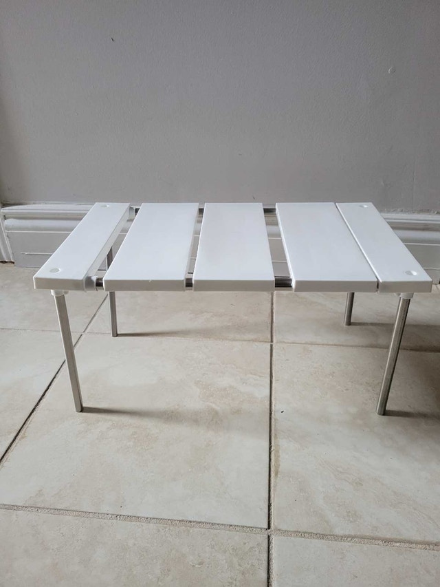 Adjustable rack shelf
