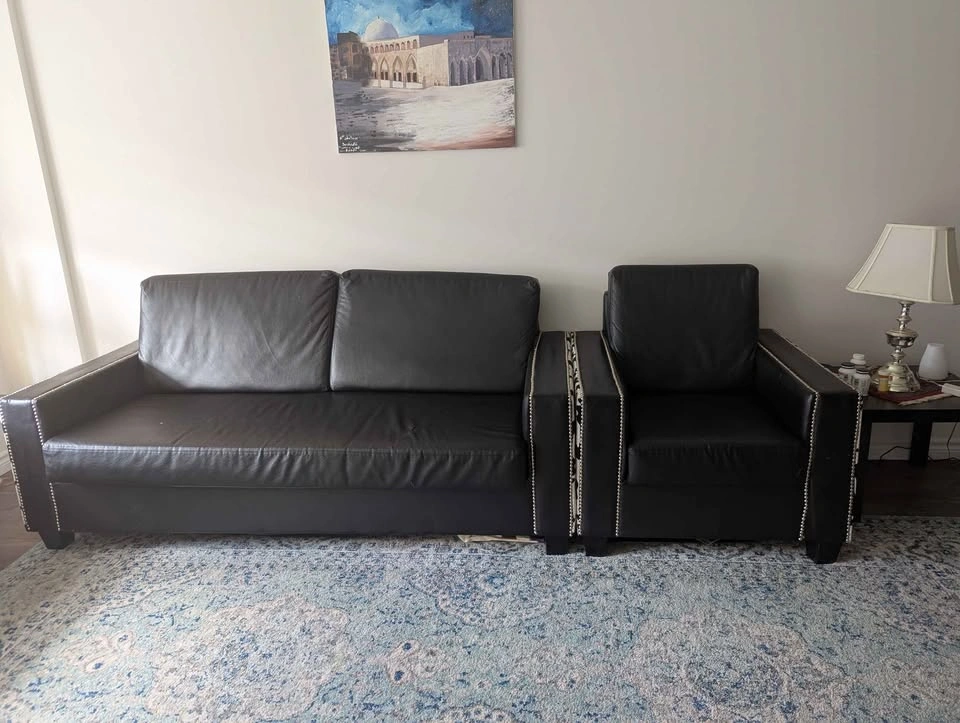 Black faux leather couch and armchair set with cow print - photo 2