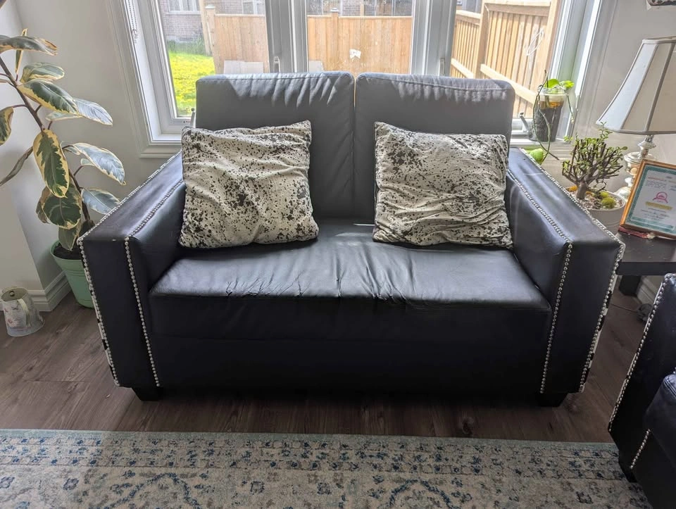 Black faux leather couch and armchair set with cow print - photo 3