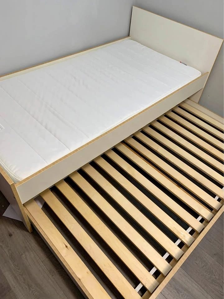 Ikea twin bed frame with pull out bed and Ikea twin mattress