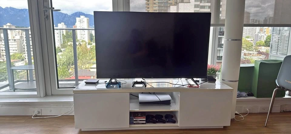 TCL 55” Smart TV and White TV Stand