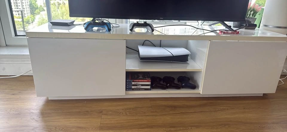 TCL 55” Smart TV and White TV Stand - photo 2