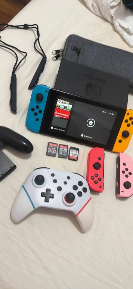 Nintendo Switch Standard + 4 Joy-Cons + Pro Controller + 3 Games - photo 2
