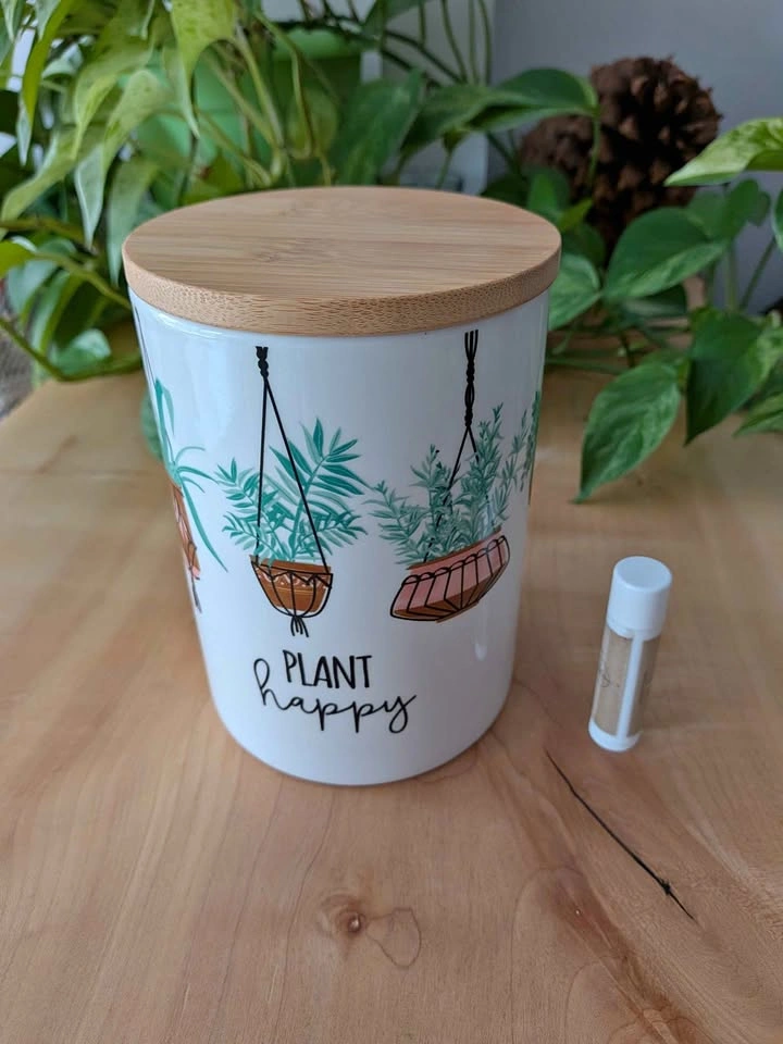 Decorative "plant happy" container