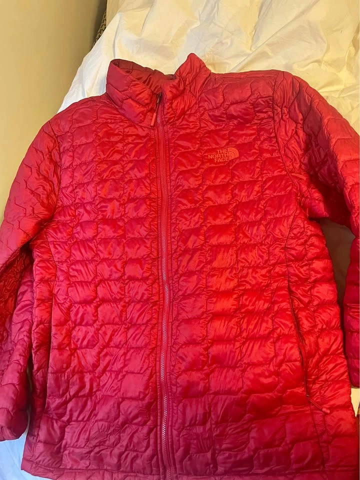 The North Face red quilted jacket Men's Medium