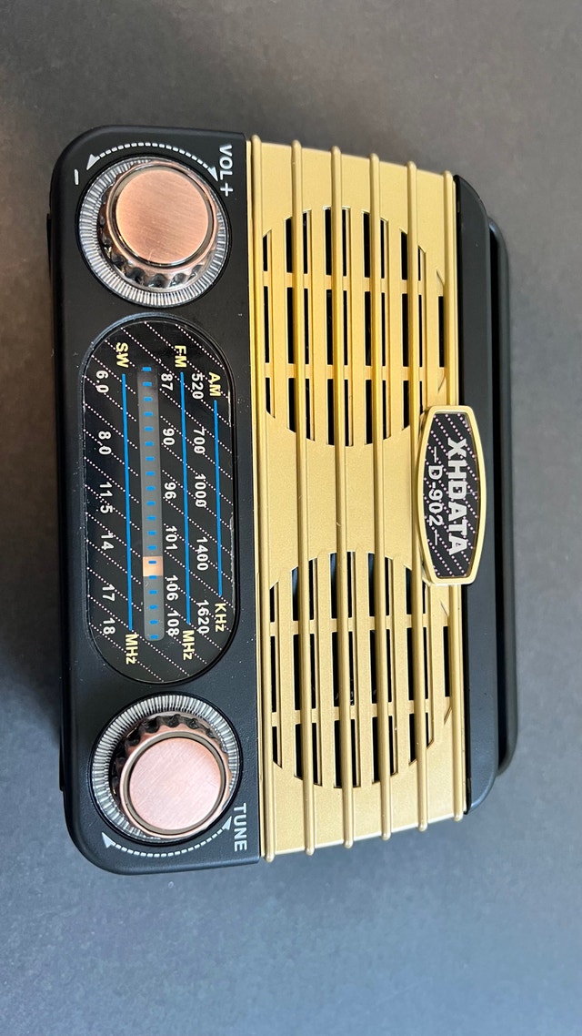 XHDATA D-902 Solar Emergency Radio, MP3 Player & Flashlight