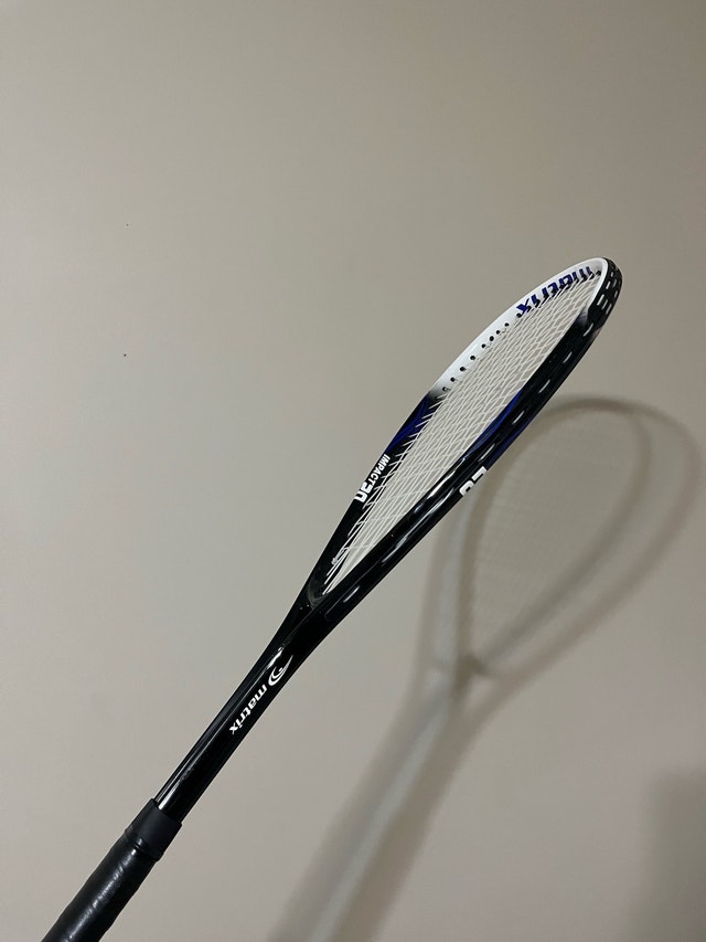squash racket and balls