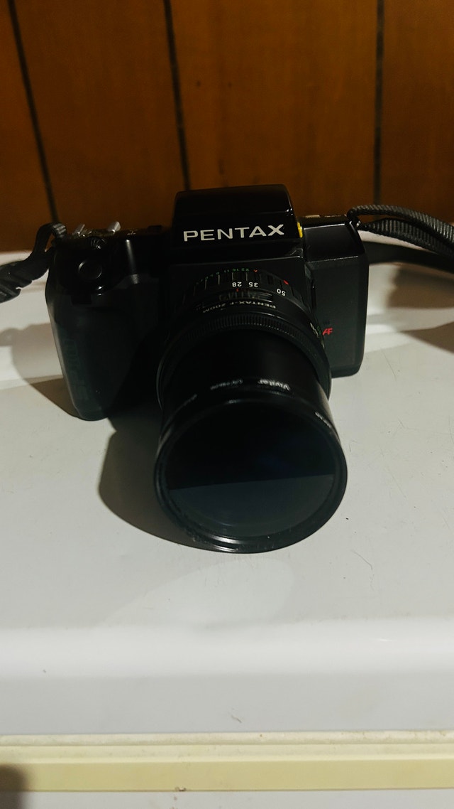 Pentax SF10 w/Accessories (Auto Flash included). All Brand New