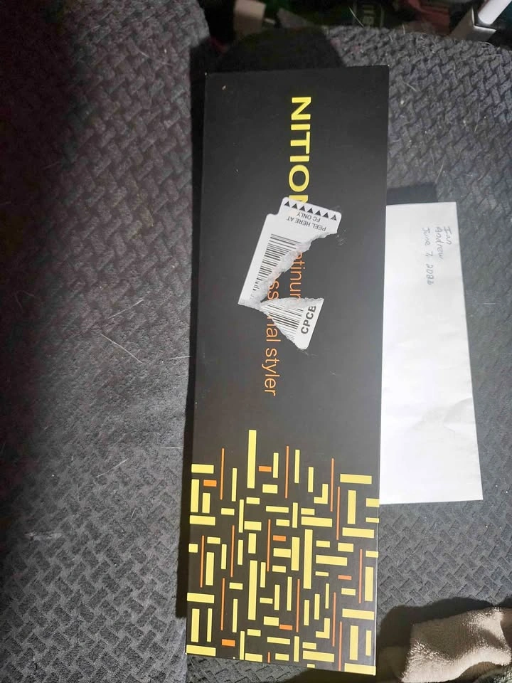 Nition brand styling iron