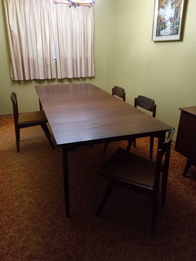 Teak dining table and chairs set