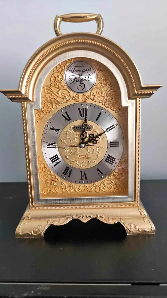 Brass quartz mantel clock thumbnail