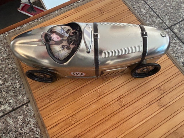 silver racing car cookie tin