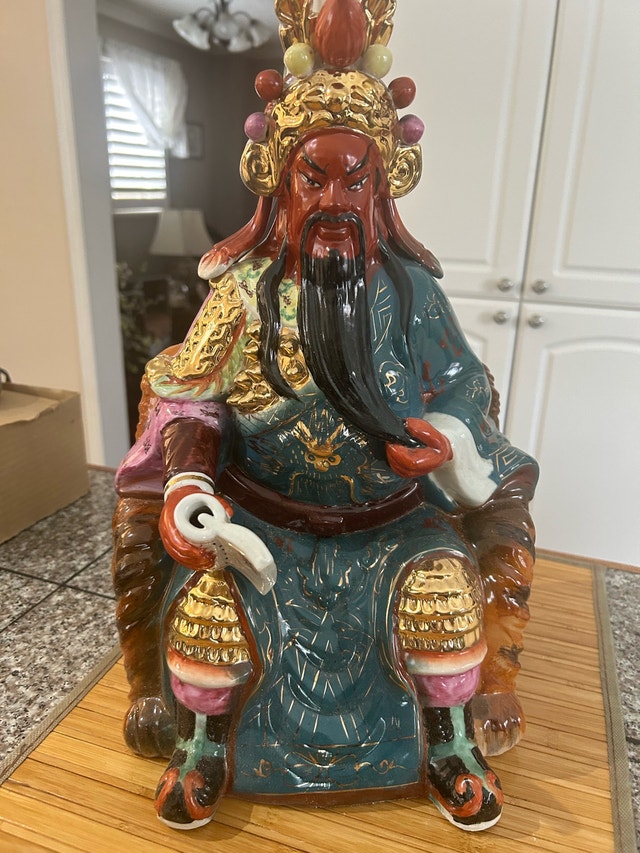 Guan Yu, the Chinese God of War, sitting, porcelain figurine