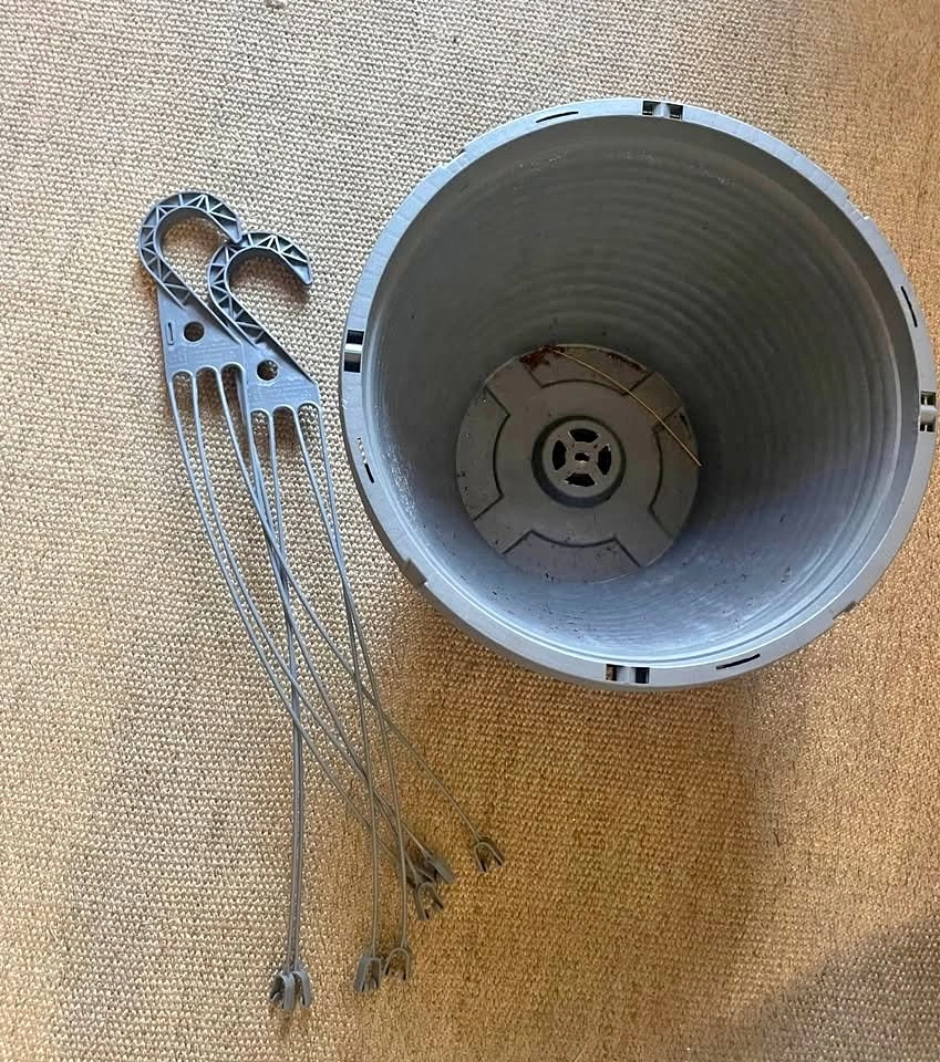 Pair of grey plastic hanging planters 12” wide