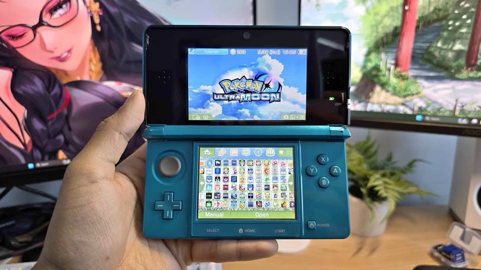 Nintendo 3DS Aqua Blue 64GB of games, charger, charging dock