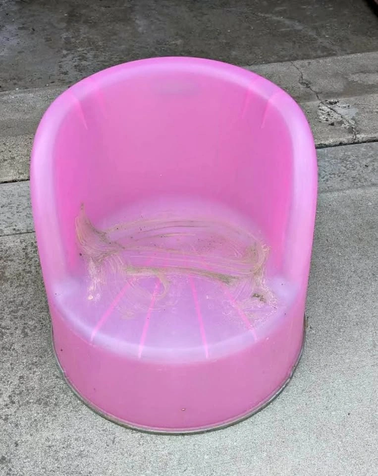 Pink Plastic ikea chair, seat height 13” has been outside
