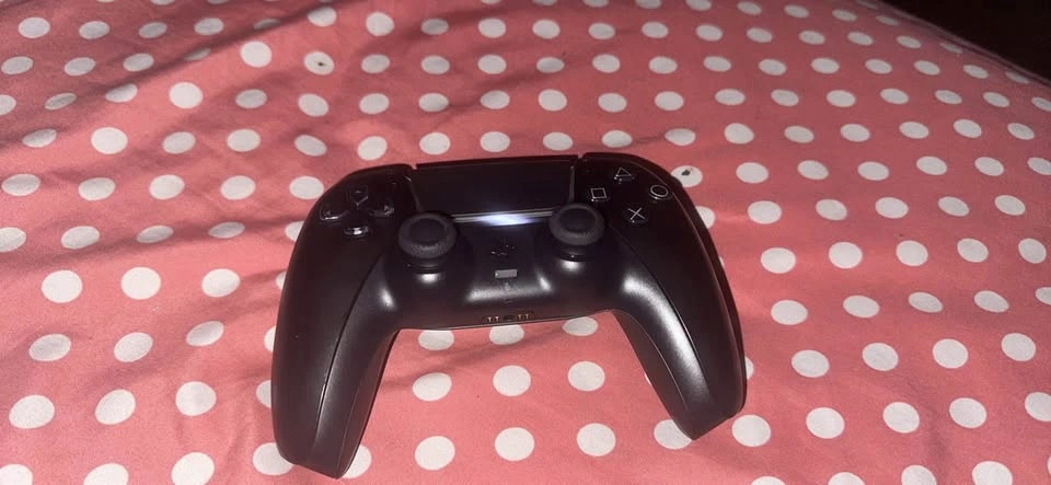 Black PlayStation controller - photo 2