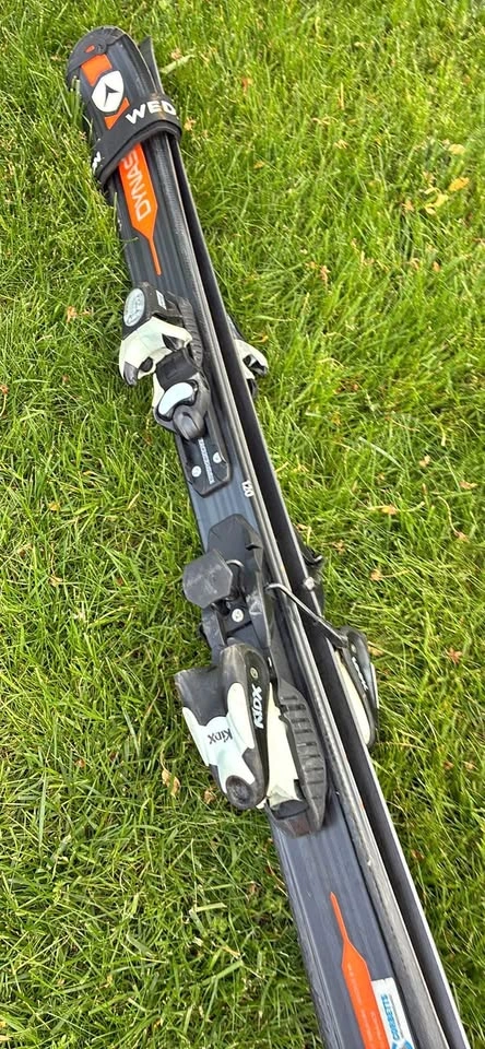 Lots of Ski Equipment - Boots, Skis, Poles