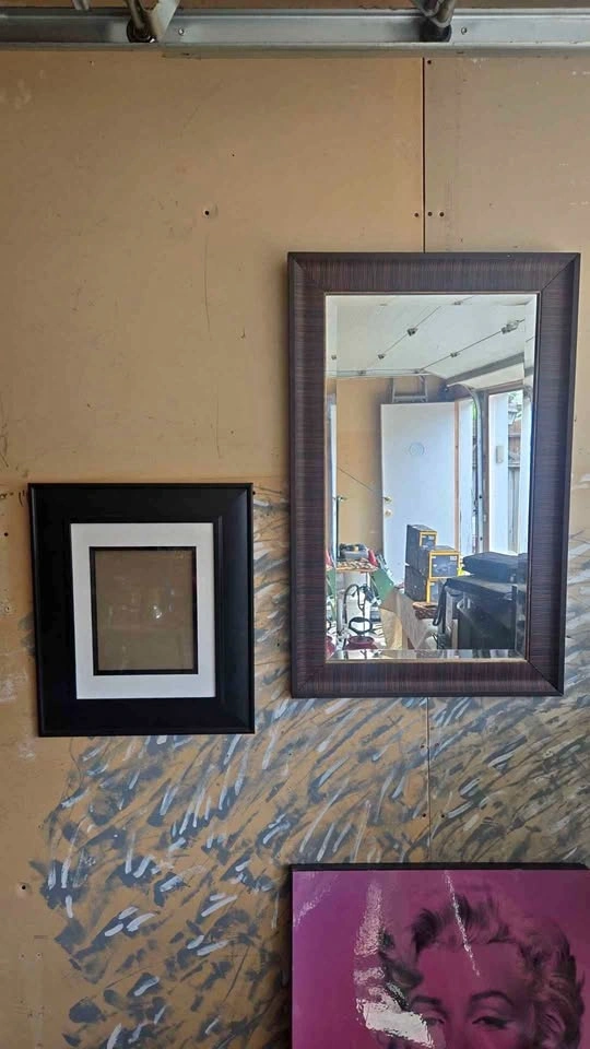 Wall Mirror and Black Picture Frame
