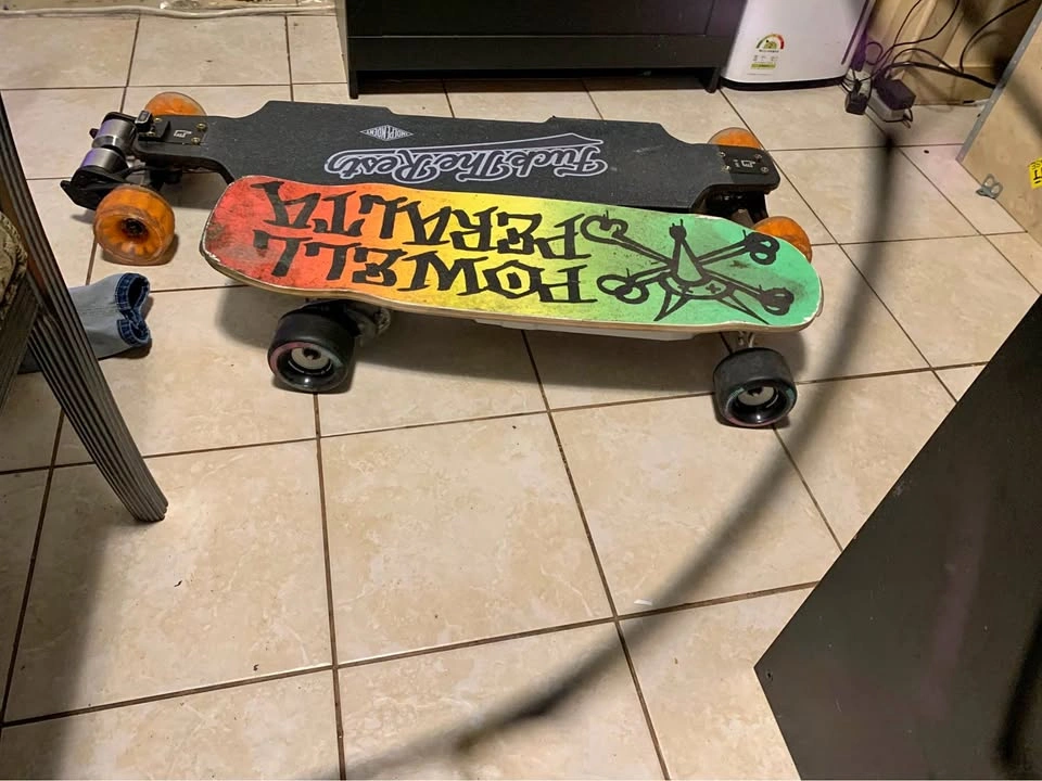 STELLA BLIZZARD AND BONE CARBON FIBER ELECTRIC SKATEBOARDS