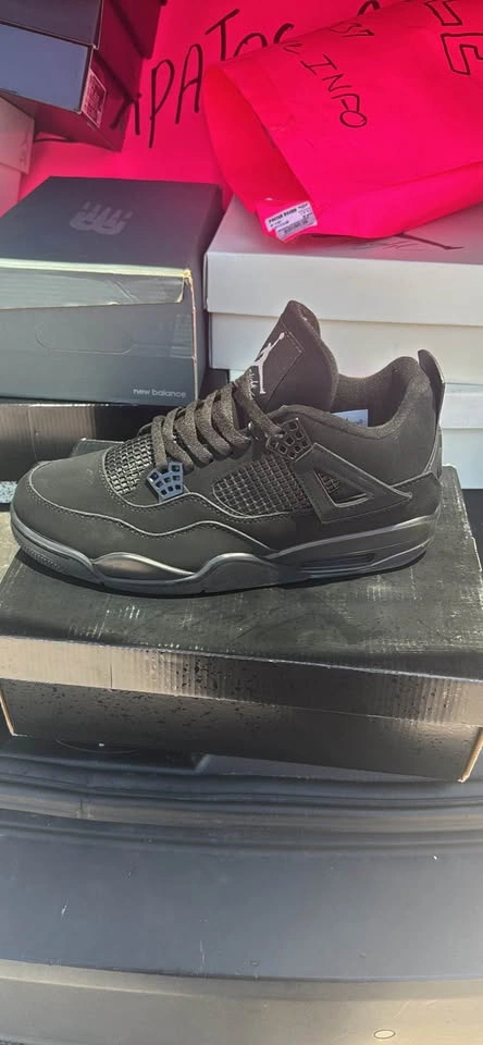 Nike Air Jordan 4s Black Sneakers - photo 4