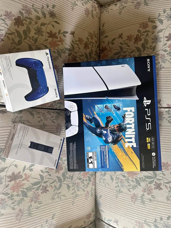 Sealed PS5 digital edition 825GB with controller and charging st