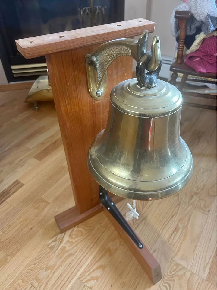 Solid antique ships bell with holder