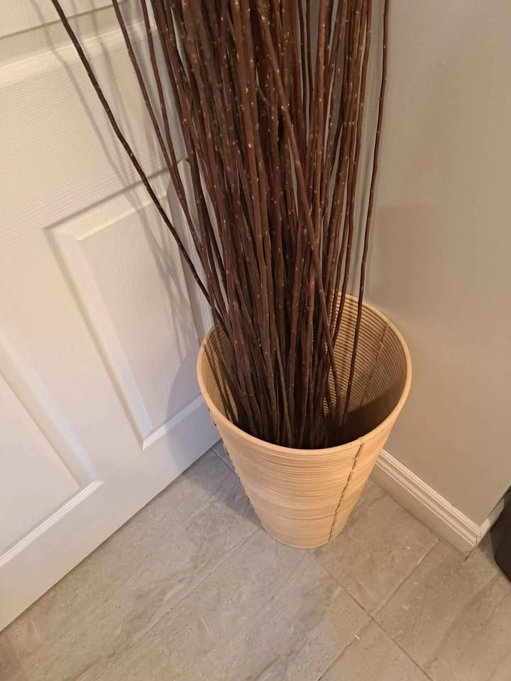 Decorative branches in wicker vase