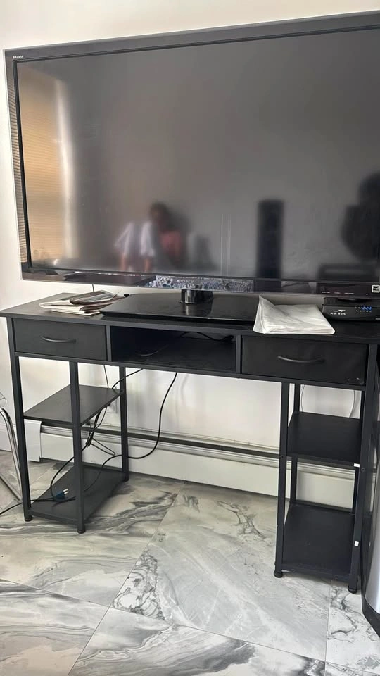 Black desk with drawers