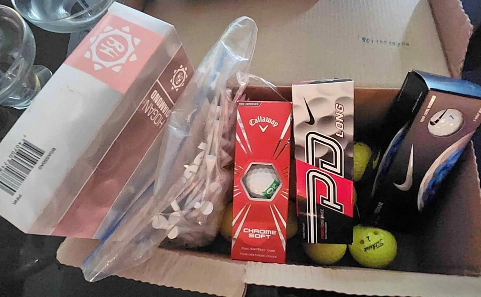 Nike, Callaway, Ben Hogan, and Titleist Golf Ball and Tee Lot