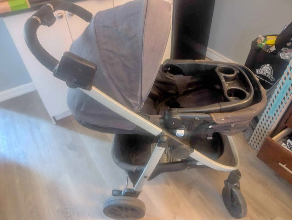 Grey and black Graco Baby Stroller