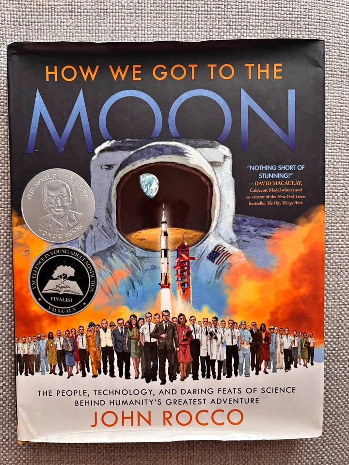 How We Got to the Moon Book by John Rocco - Hardcover⚽️