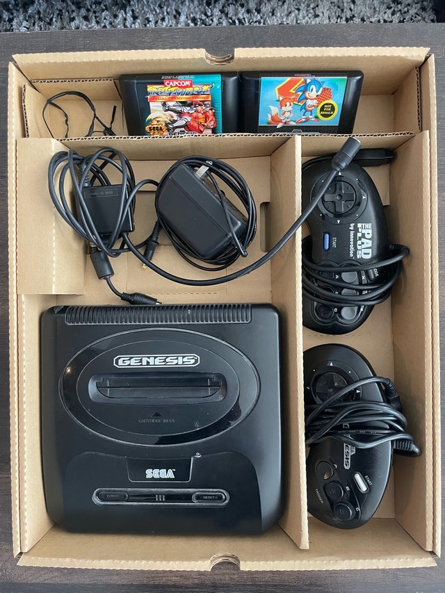 Sega Genesis with two games + original box and manual ⚽️