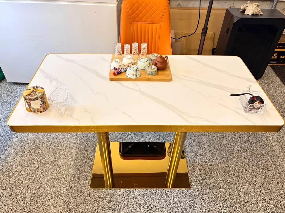 24x48 inch dining table, sinter stone top, gold pole and base