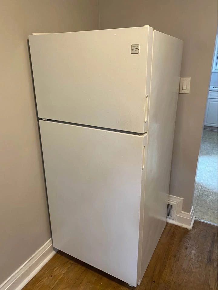 Selling a working white kenmore top-freezer refrigerator