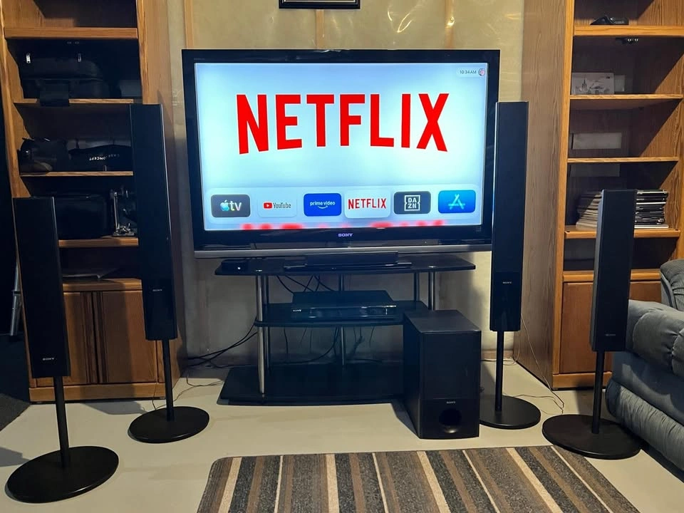 Sony 52" TV, 5.1 Surround Sound, Apple TV 4K & Stand - photo 2