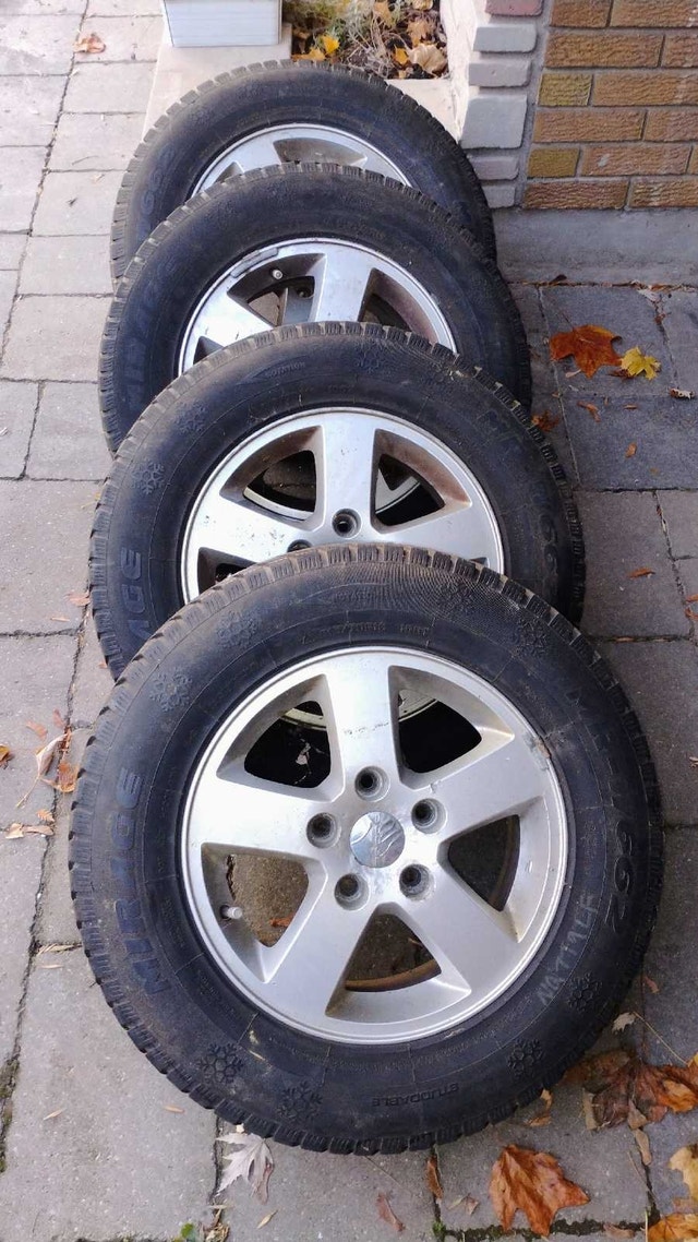 16 aluminum rims and tires from Dodge Grand Caravan